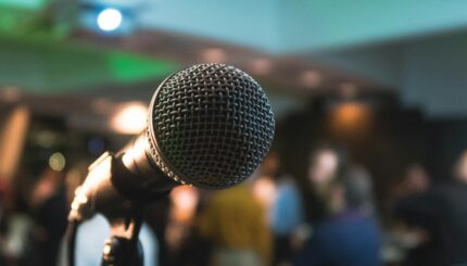 silver corded microphone in shallow focus photography